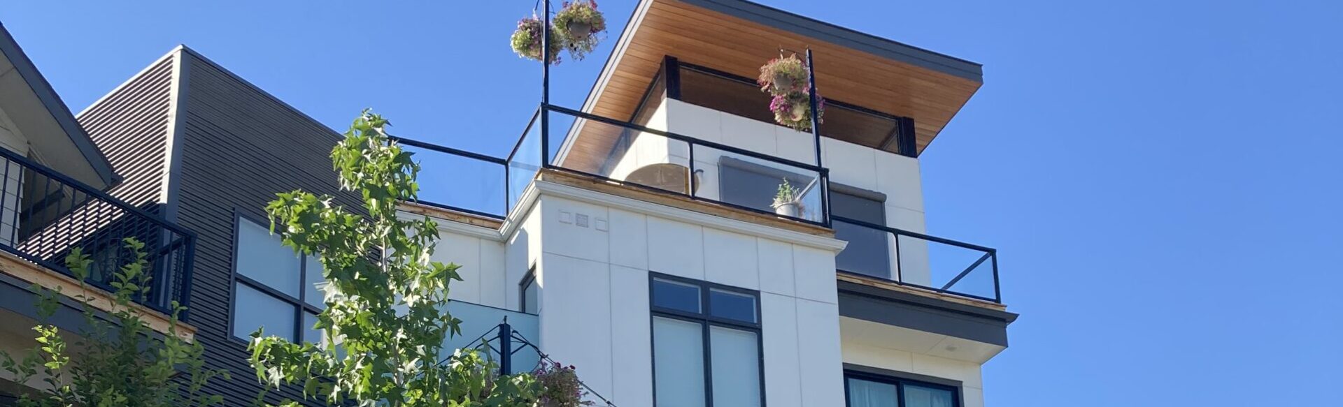 Second story of apartments with balcony.